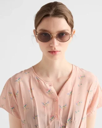 Prada Sunglasses with the Iconic Metal Plaque